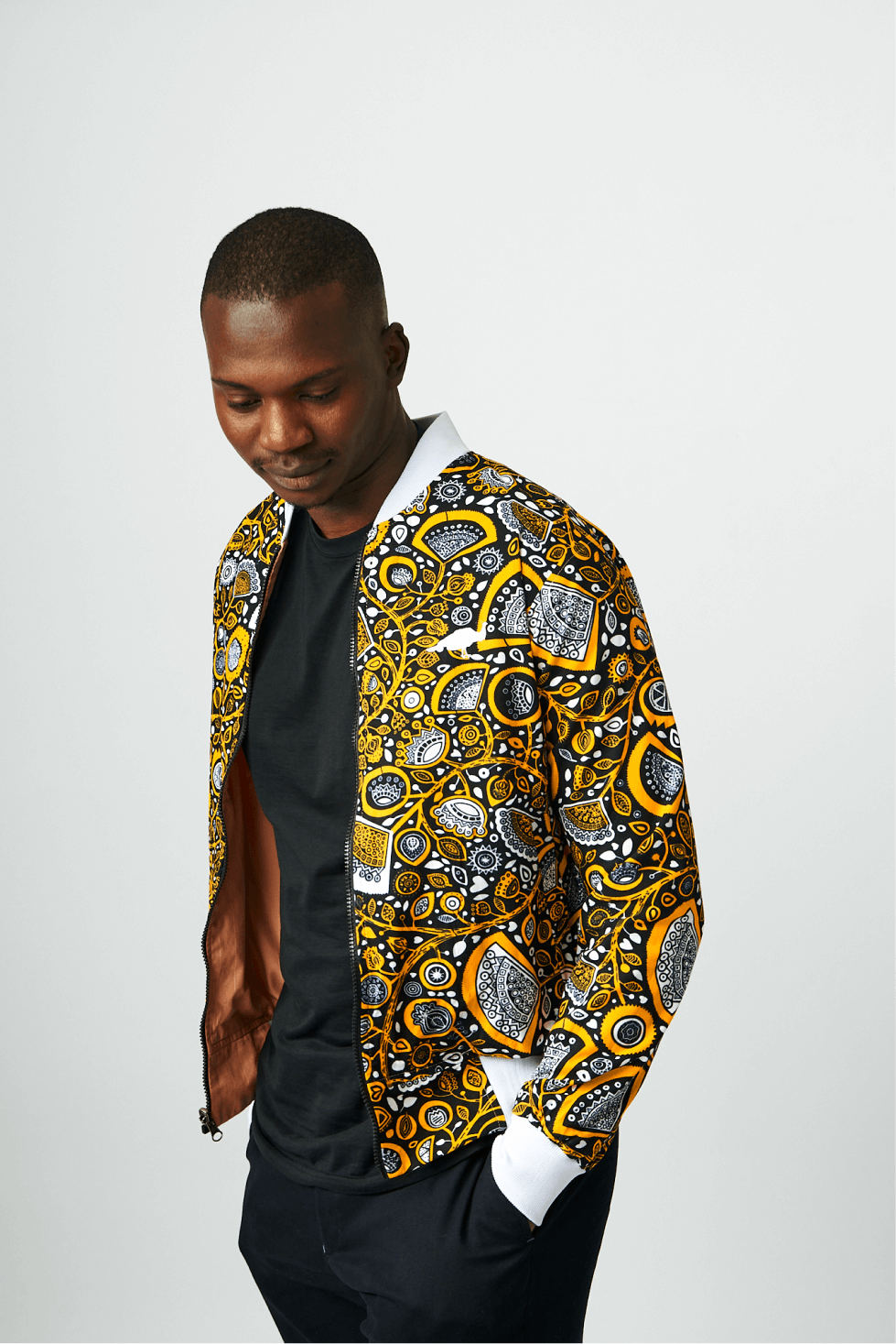Shop Coral Double Sided Bomber Suit Jacket by Genteel on Arrai. Discover stylish, affordable clothing, jewelry, handbags and unique handmade pieces from top Kenyan & African fashion brands prioritising sustainability and quality craftsmanship.
