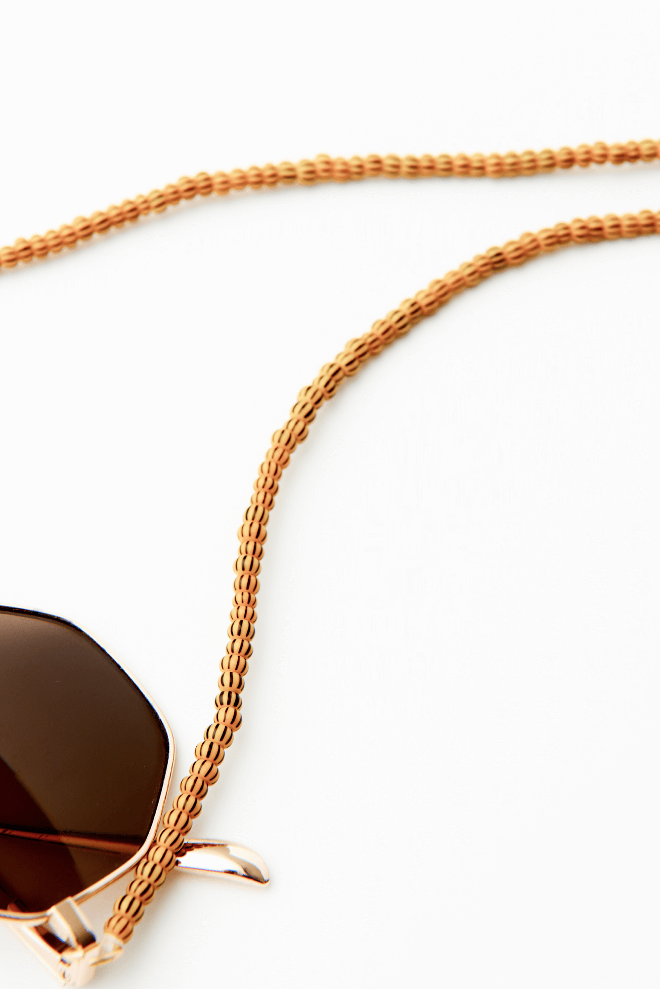 Shop The Arthur Sunglasses Cord by Soluna Collections on Arrai. Discover stylish, affordable clothing, jewelry, handbags and unique handmade pieces from top Kenyan & African fashion brands prioritising sustainability and quality craftsmanship.