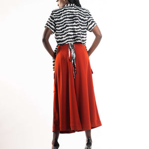 Shop Electric Print Strings Attached Shirt by NC Nairobi on Arrai. Discover stylish, affordable clothing, jewelry, handbags and unique handmade pieces from top Kenyan & African fashion brands prioritising sustainability and quality craftsmanship.
