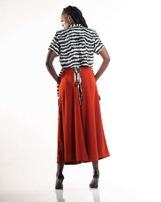 Shop Electric Print Strings Attached Shirt by NC Nairobi on Arrai. Discover stylish, affordable clothing, jewelry, handbags and unique handmade pieces from top Kenyan & African fashion brands prioritising sustainability and quality craftsmanship.