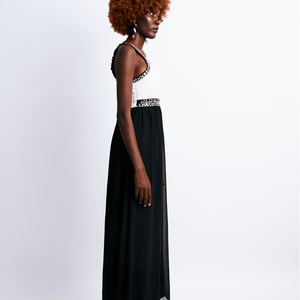 Shop Black & White Floor Length Halter Dress by The Fashion Frenzy on Arrai. Discover stylish, affordable clothing, jewelry, handbags and unique handmade pieces from top Kenyan & African fashion brands prioritising sustainability and quality craftsmanship