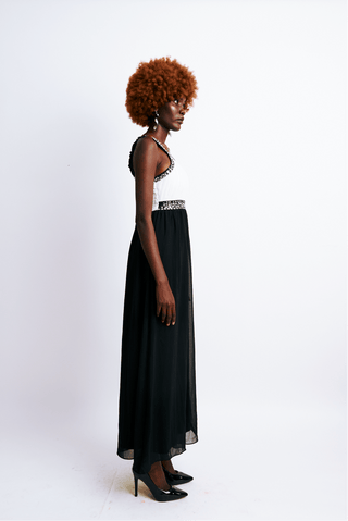 Shop Black & White Floor Length Halter Dress by The Fashion Frenzy on Arrai. Discover stylish, affordable clothing, jewelry, handbags and unique handmade pieces from top Kenyan & African fashion brands prioritising sustainability and quality craftsmanship