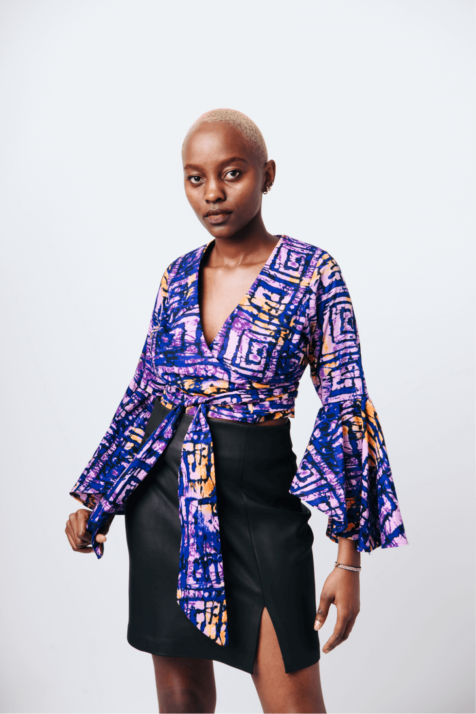 Shop Bell Sleeve Wrap Crop Top by Cyami Custom Fit on Arrai. Discover stylish, affordable clothing, jewelry, handbags and unique handmade pieces from top Kenyan & African fashion brands prioritising sustainability and quality craftsmanship.
