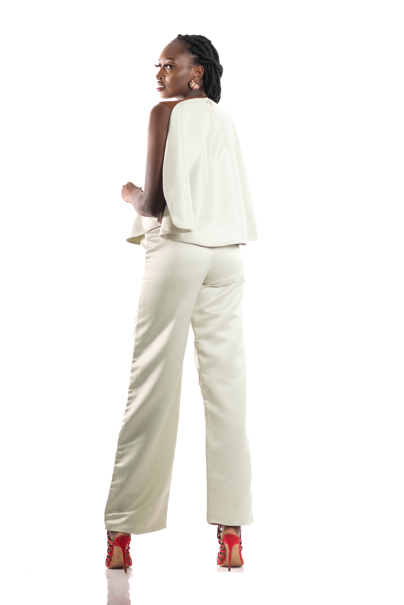 Shop Set of 2: Wide Leg Pants and Cape Top by Eva Wambutu on Arrai. Discover stylish, affordable clothing, jewelry, handbags and unique handmade pieces from top Kenyan & African fashion brands prioritising sustainability and quality craftsmanship.