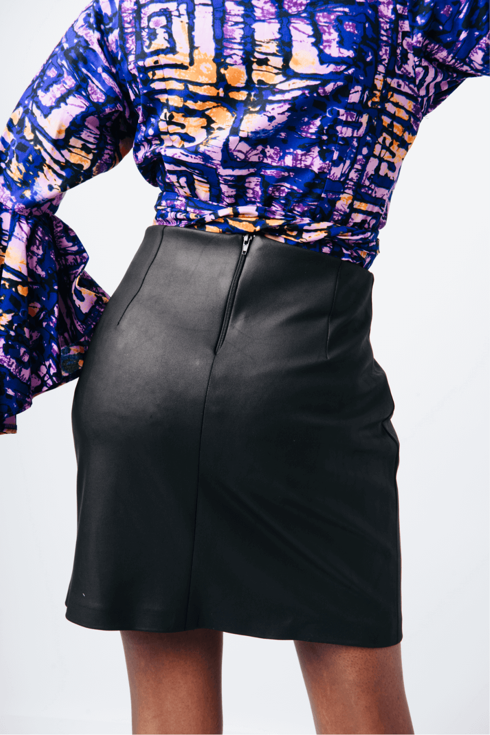Shop Chera Vegan Leather Mini Skirt by Cyami Custom Fit on Arrai. Discover stylish, affordable clothing, jewelry, handbags and unique handmade pieces from top Kenyan & African fashion brands prioritising sustainability and quality craftsmanship.