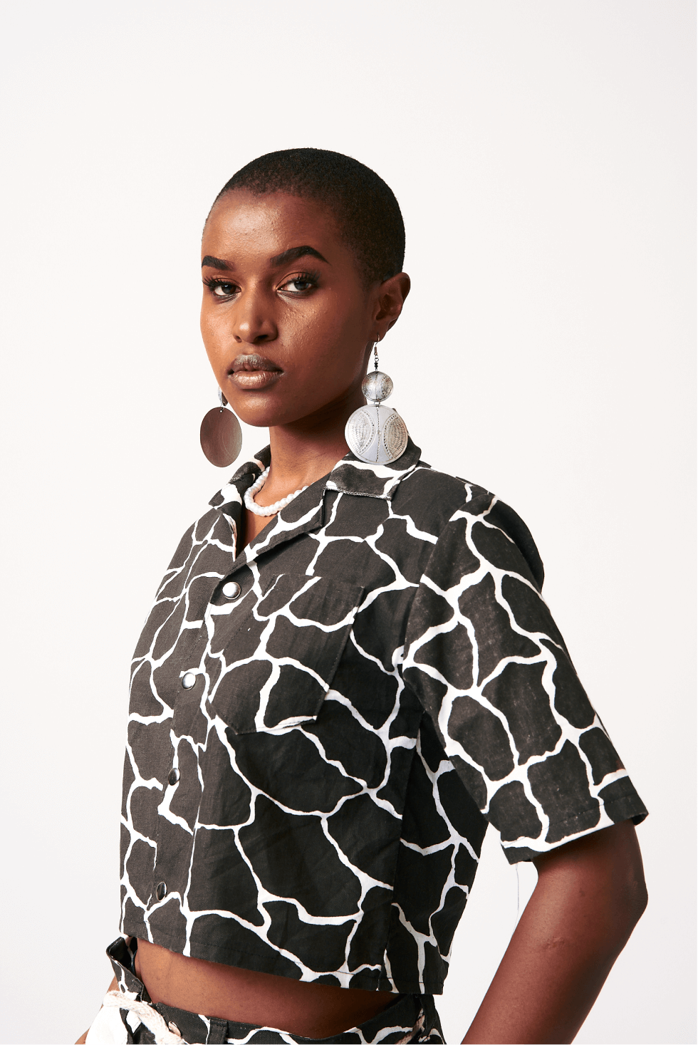 Shop Twiga Print Top by Nairobi Apparel District on Arrai. Discover stylish, affordable clothing, jewelry, handbags and unique handmade pieces from top Kenyan & African fashion brands prioritising sustainability and quality craftsmanship.