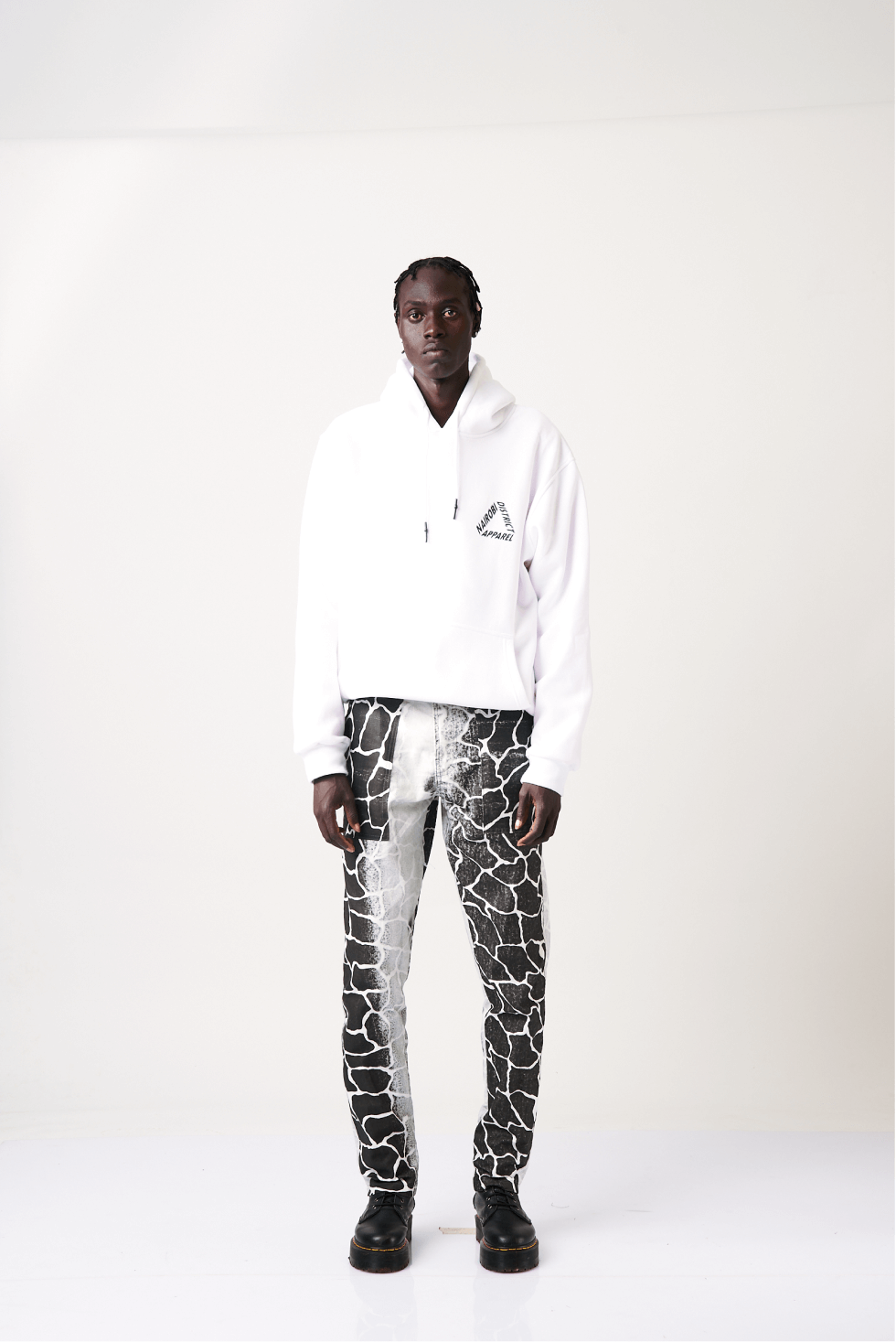 Shop Twiga Print Pants by Nairobi Apparel District on Arrai. Discover stylish, affordable clothing, jewelry, handbags and unique handmade pieces from top Kenyan & African fashion brands prioritising sustainability and quality craftsmanship.