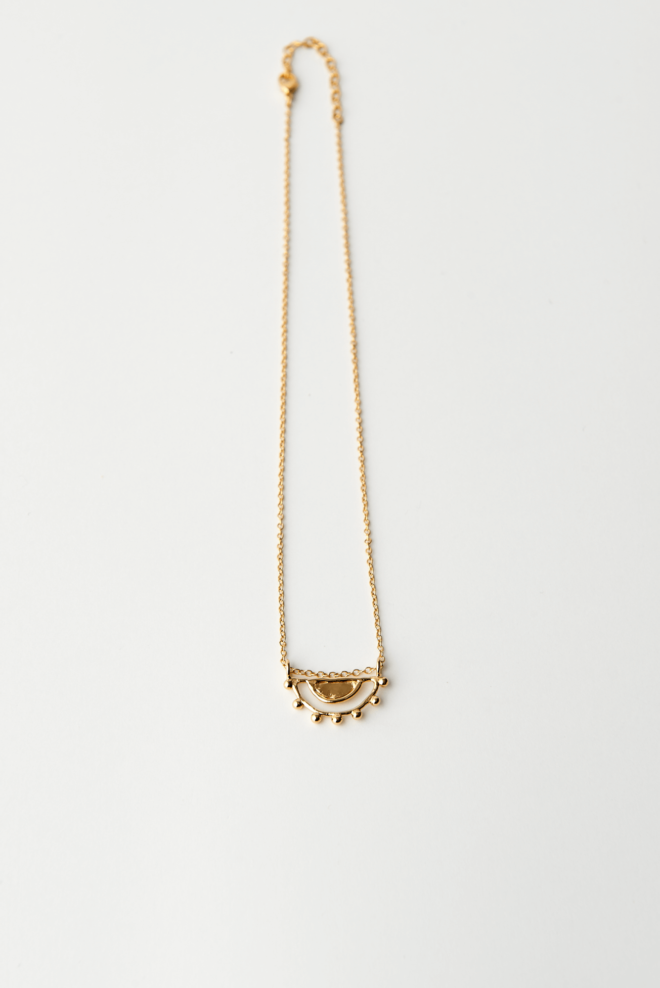 Shop Jicho Pendant and Chain Necklace by We Are NBO on Arrai. Discover stylish, affordable clothing, jewelry, handbags and unique handmade pieces from top Kenyan & African fashion brands prioritising sustainability and quality craftsmanship.