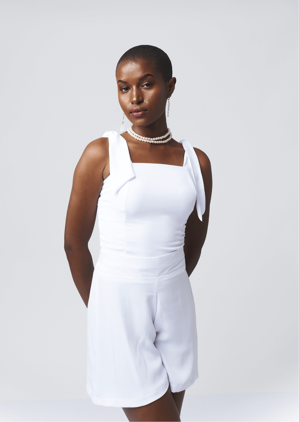 Shop Ribbed Tie Sleeveless Top by Cyami Custom Fit on Arrai. Discover stylish, affordable clothing, jewelry, handbags and unique handmade pieces from top Kenyan & African fashion brands prioritising sustainability and quality craftsmanship.