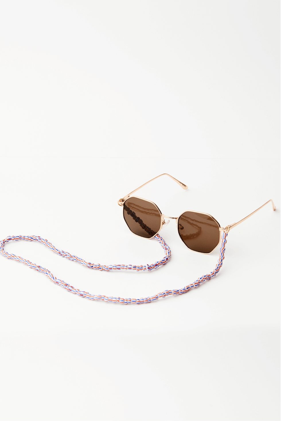 Shop The Katia Sunglasses Cord by Soluna Collections on Arrai. Discover stylish, affordable clothing, jewelry, handbags and unique handmade pieces from top Kenyan & African fashion brands prioritising sustainability and quality craftsmanship.