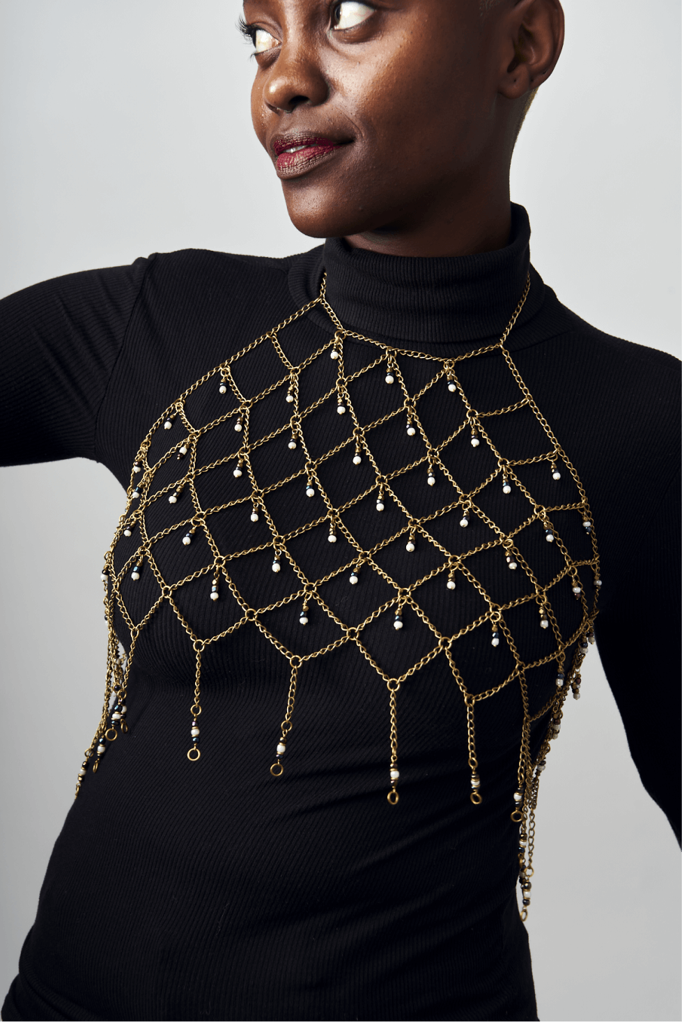 Shop Halter Mesh Brass Top by Tiger Tail Twister on Arrai. Discover stylish, affordable clothing, jewelry, handbags and unique handmade pieces from top Kenyan & African fashion brands prioritising sustainability and quality craftsmanship.