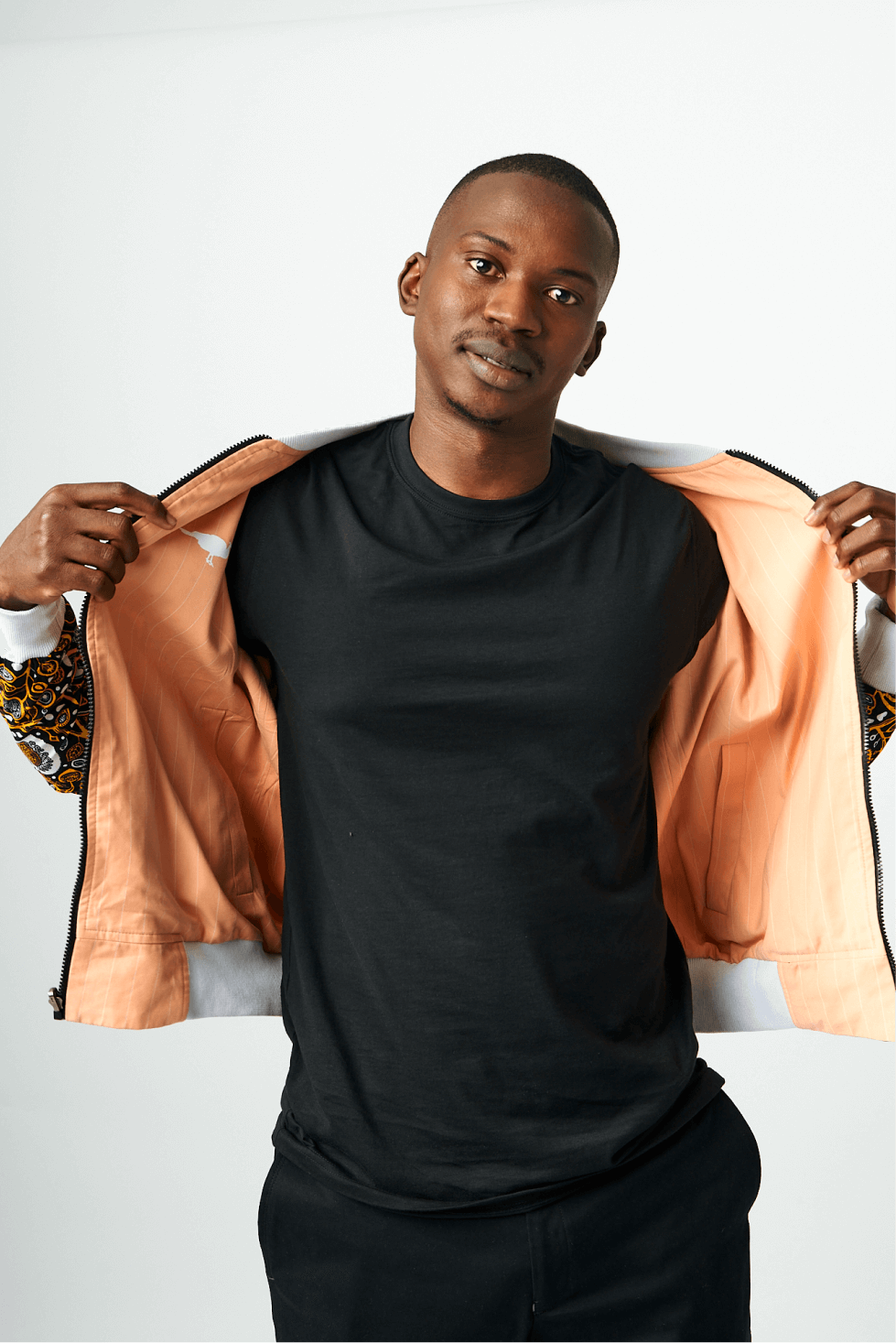 Shop Coral Double Sided Bomber Suit Jacket by Genteel on Arrai. Discover stylish, affordable clothing, jewelry, handbags and unique handmade pieces from top Kenyan & African fashion brands prioritising sustainability and quality craftsmanship.