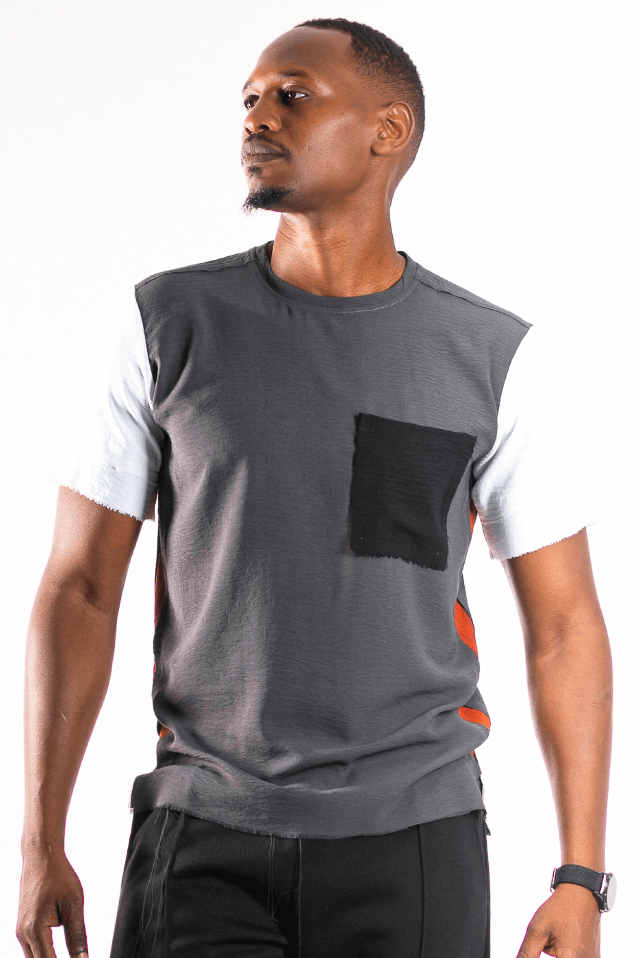 Unfinished Classic NC T-Shirt - Tops by NC Nairobi. Shop on Arrai now! Stand out in style with our classic and smart short-sleeved Men's T-Shirt. Made from textured viscose, this shirt features a unique blend of NC Nairobi classic colours, unfinished edge