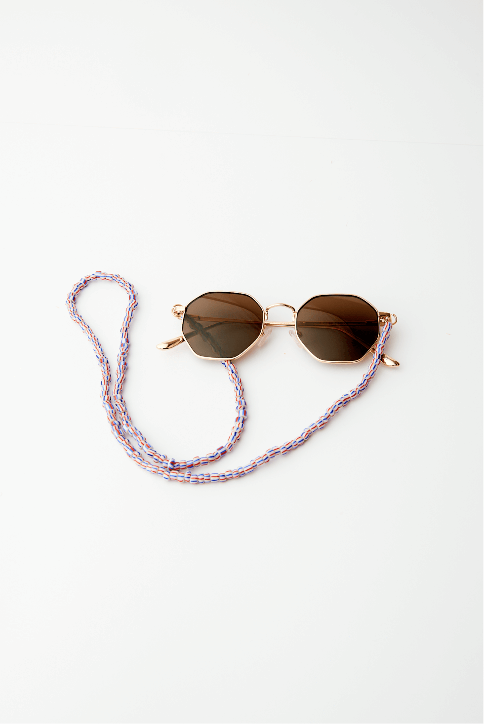 Shop The Katia Sunglasses Cord by Soluna Collections on Arrai. Discover stylish, affordable clothing, jewelry, handbags and unique handmade pieces from top Kenyan & African fashion brands prioritising sustainability and quality craftsmanship.