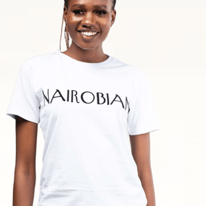Shop Nairobian Plain T-Shirt (Black Text Print) by Kali Works on Arrai. Discover stylish, affordable clothing, jewelry, handbags and unique handmade pieces from top Kenyan & African fashion brands prioritising sustainability and quality craftsmanship.
