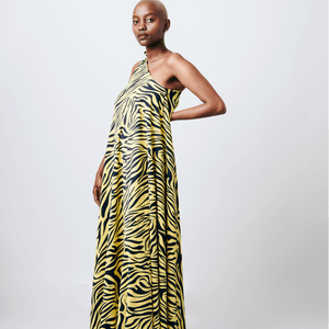 Shop Mara Tie One-Shoulder Maxi Dress by Cyami Custom Fit on Arrai. Discover stylish, affordable clothing, jewelry, handbags and unique handmade pieces from top Kenyan & African fashion brands prioritising sustainability and quality craftsmanship.