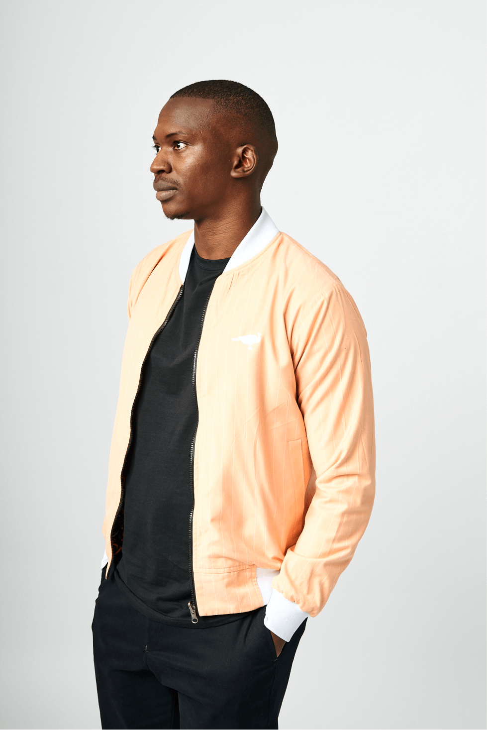 Shop Coral Double Sided Bomber Suit Jacket by Genteel on Arrai. Discover stylish, affordable clothing, jewelry, handbags and unique handmade pieces from top Kenyan & African fashion brands prioritising sustainability and quality craftsmanship.