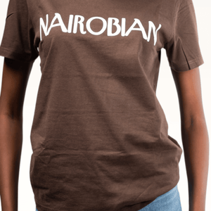 Shop Nairobian Plain T-Shirt (White Text Print) by Kali Works on Arrai. Discover stylish, affordable clothing, jewelry, handbags and unique handmade pieces from top Kenyan & African fashion brands prioritising sustainability and quality craftsmanship.