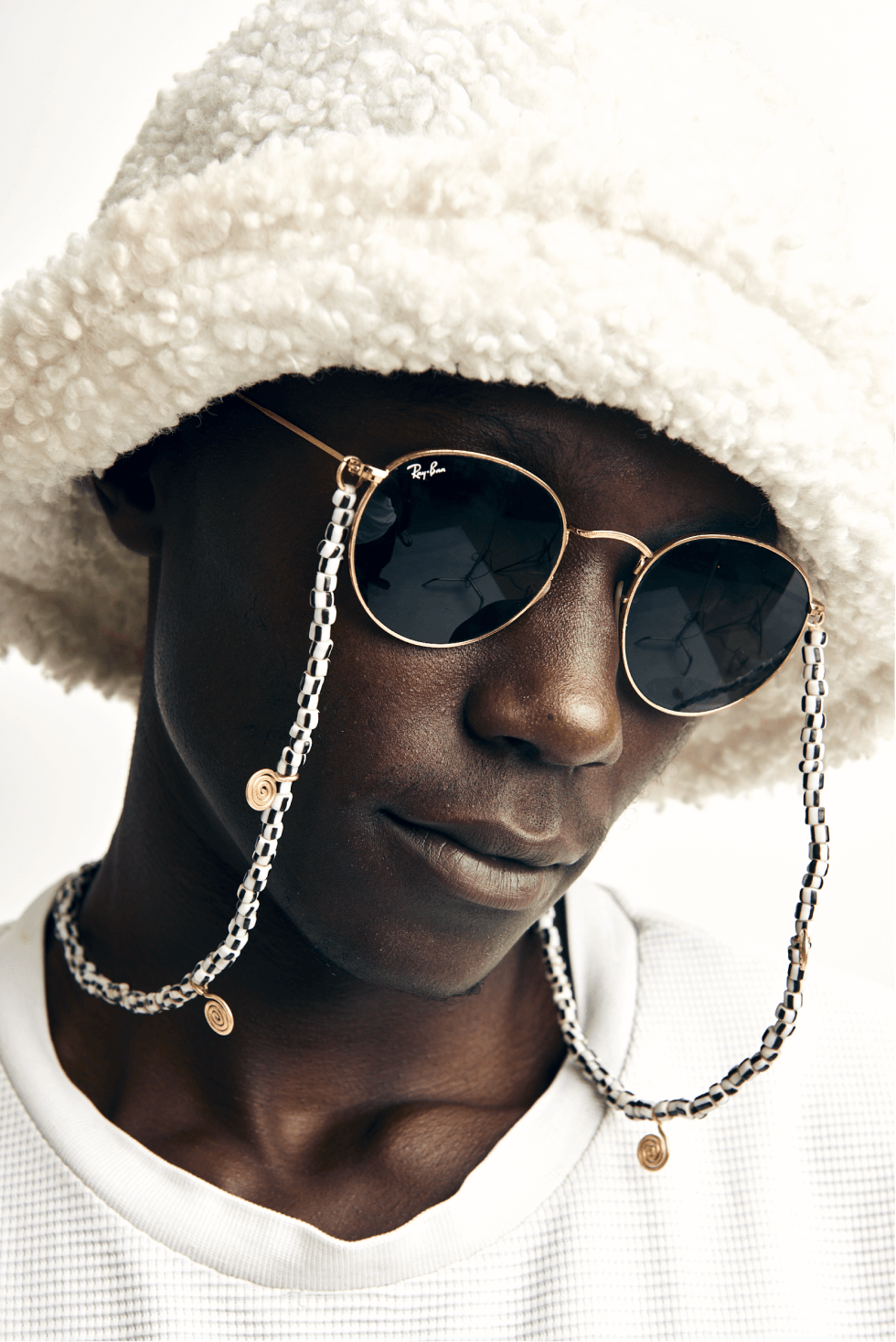 Shop The Antoine Sunglasses Cord by Soluna Collections on Arrai. Discover stylish, affordable clothing, jewelry, handbags and unique handmade pieces from top Kenyan & African fashion brands prioritising sustainability and quality craftsmanship.