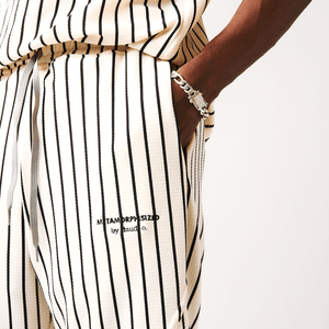 Shop Bahari Striped Pants by Metamorphisized on Arrai. Discover stylish, affordable clothing, jewelry, handbags and unique handmade pieces from top Kenyan & African fashion brands prioritising sustainability and quality craftsmanship.