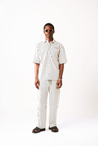 Shop Bahari Striped Pants by Metamorphisized on Arrai. Discover stylish, affordable clothing, jewelry, handbags and unique handmade pieces from top Kenyan & African fashion brands prioritising sustainability and quality craftsmanship.